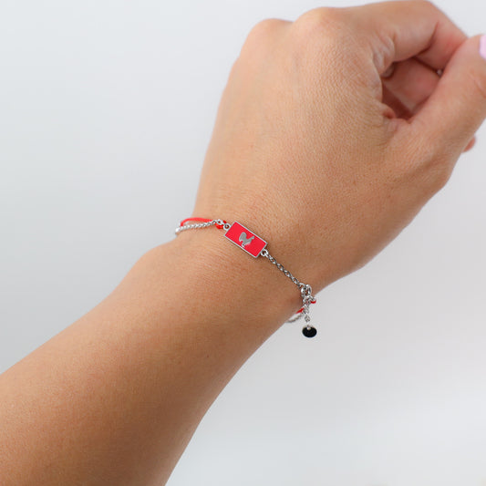 Rooster zodiac red string bracelet with silver chain, close-up detail - Crowned
