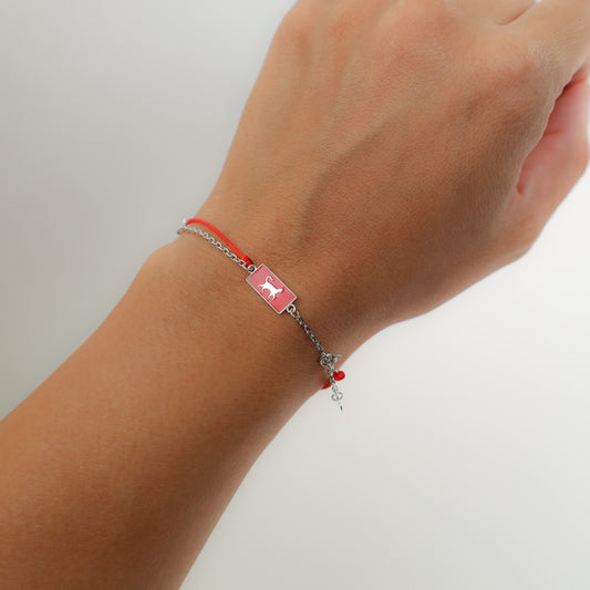 Cat zodiac red string bracelet with silver chain, close-up detail - Crowned