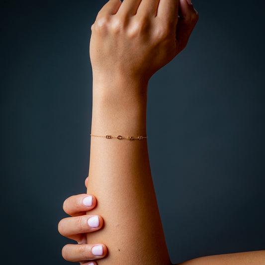BOSS Chain Bracelet, Built On Self Success gold bracelet, lifestyle shot - Crowned