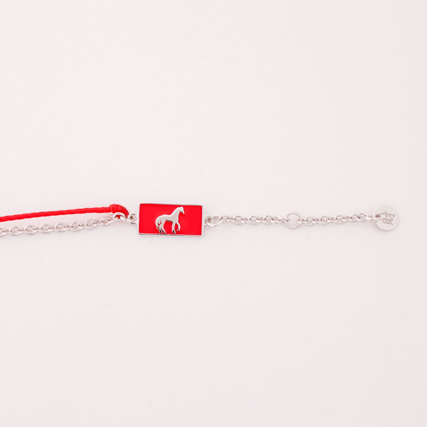 Horse zodiac red string bracelet with white gold chain, wrist view - Crowned