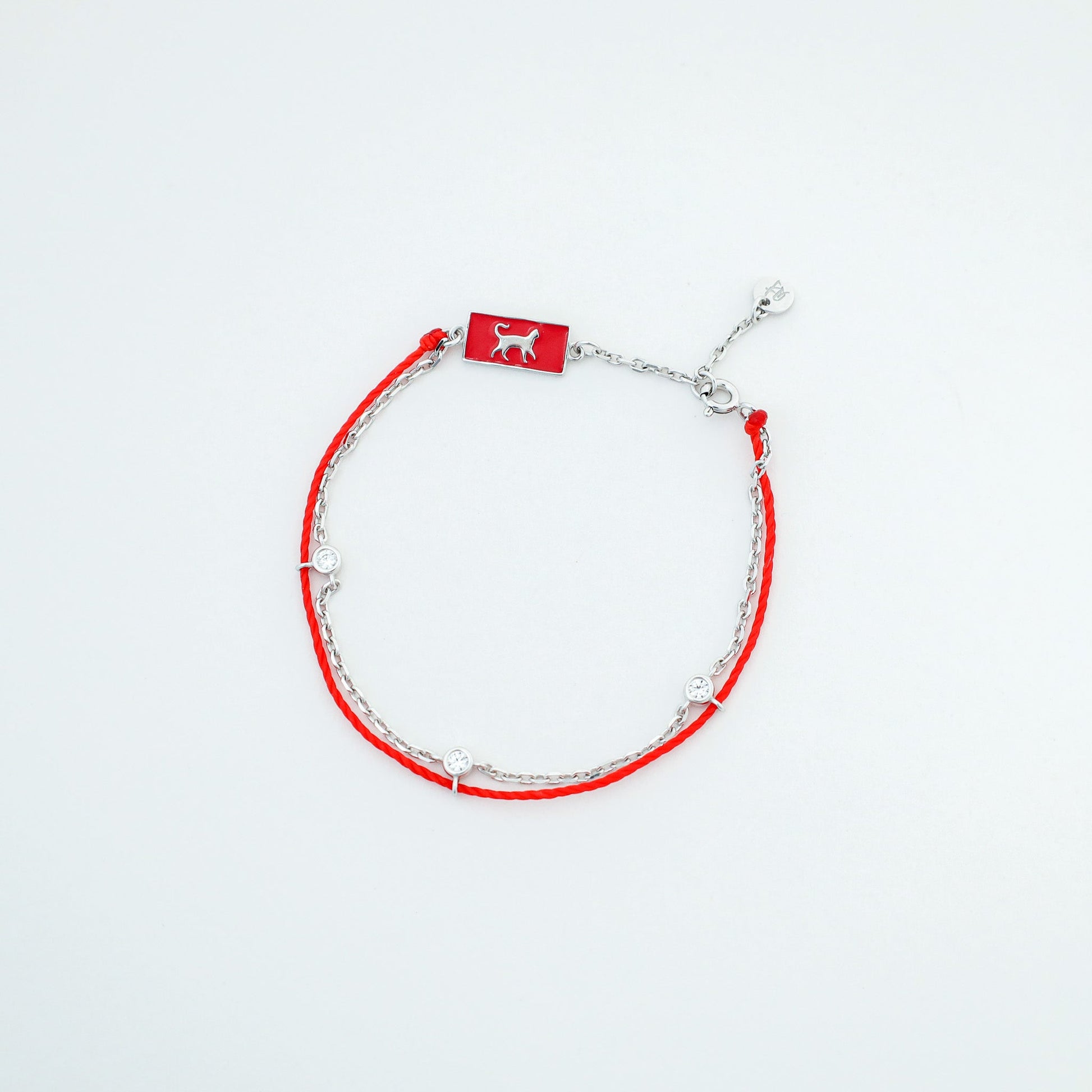 Cat zodiac red string bracelet with white gold chain, wrist view - Crowned