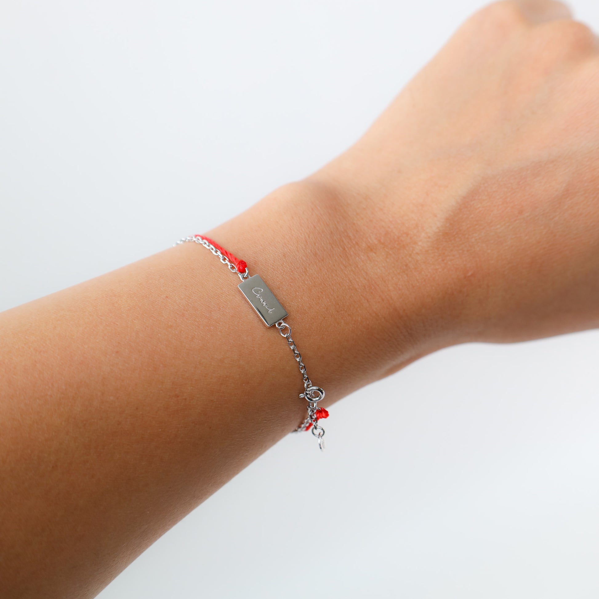 Monkey zodiac red string bracelet with silver chain, lifestyle shot - Crowned