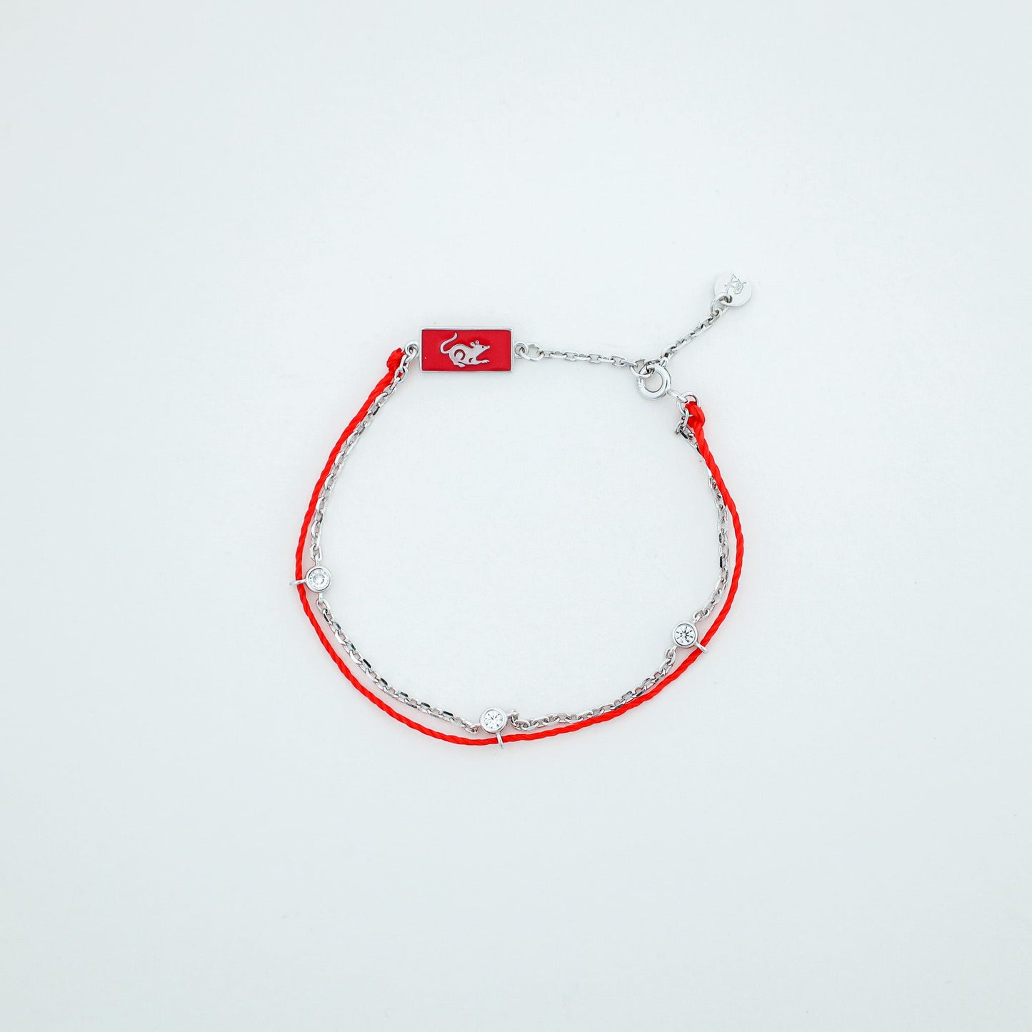 Rat zodiac red string bracelet with white gold chain, wrist view - Crowned