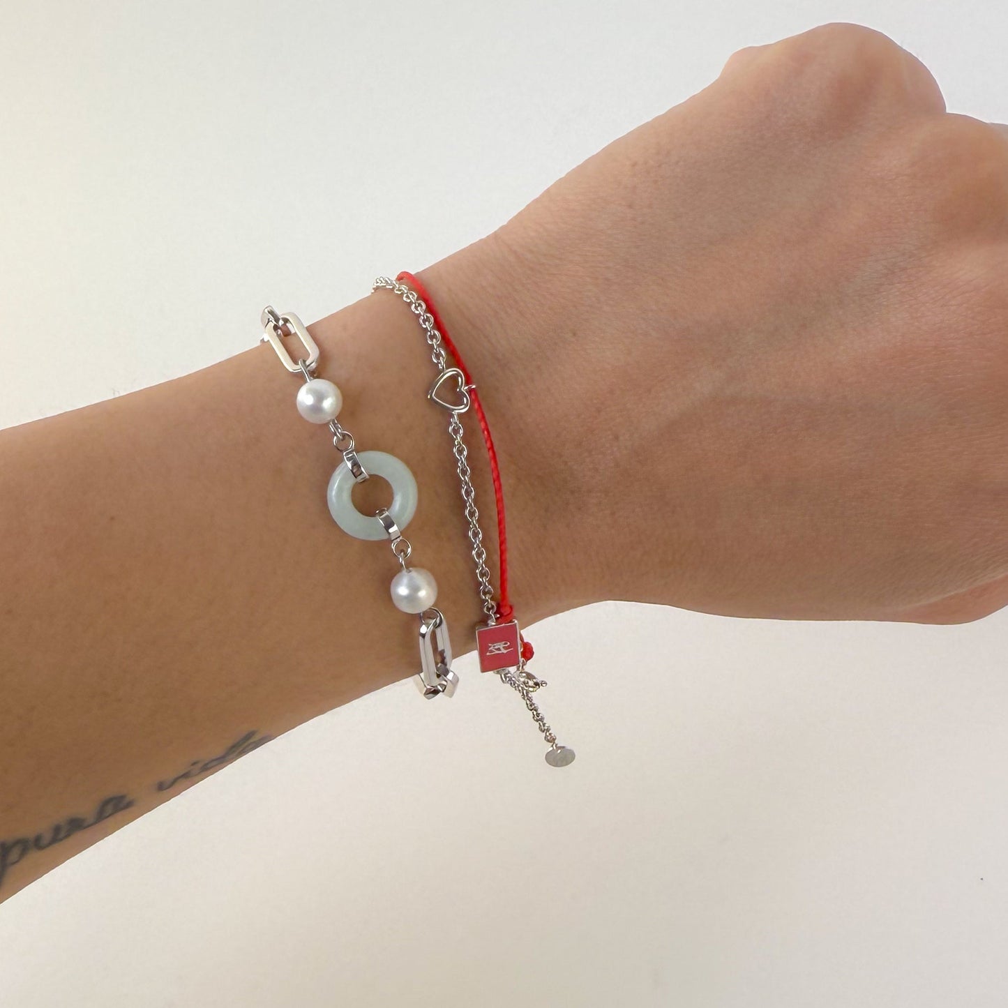 Beauty and Affluence Bracelet with Grade A Burmese jade and freshwater pearls in 14k white gold, flat lay - Crowned