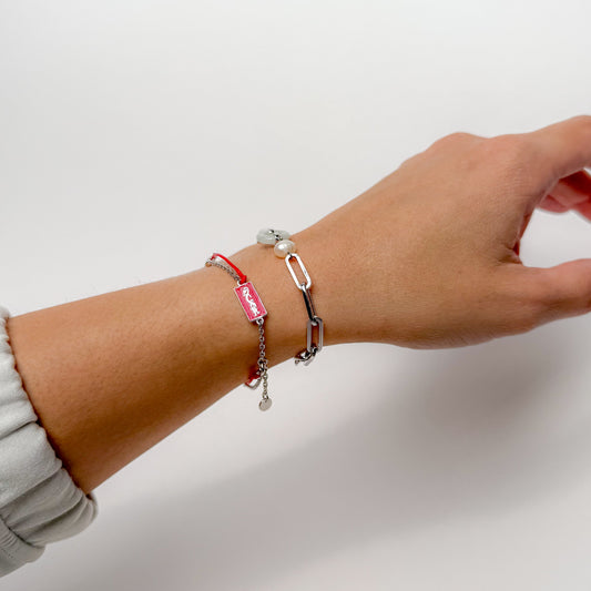 Dragon zodiac red string bracelet with white gold chain, flat lay - Crowned