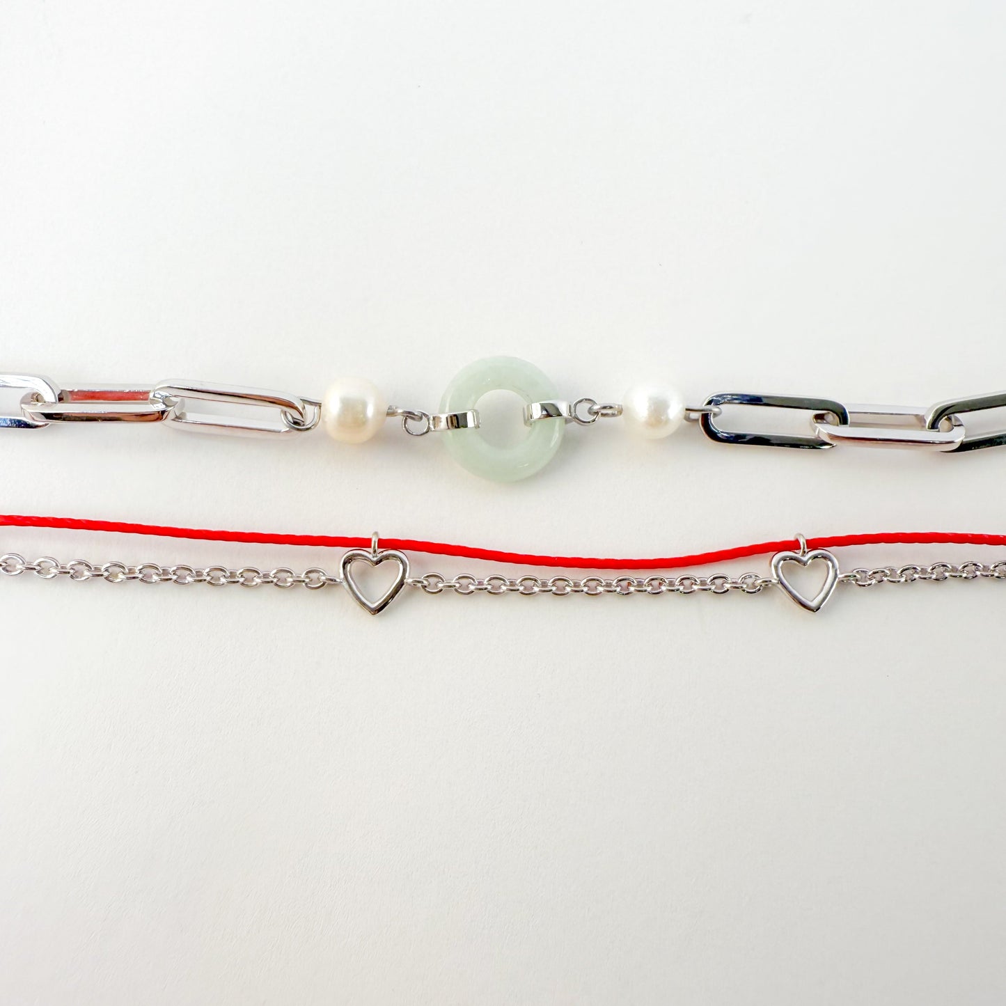 Heart Gold Red String Good Luck Bracelet in 14k white gold, flat lay - Crowned jewelry