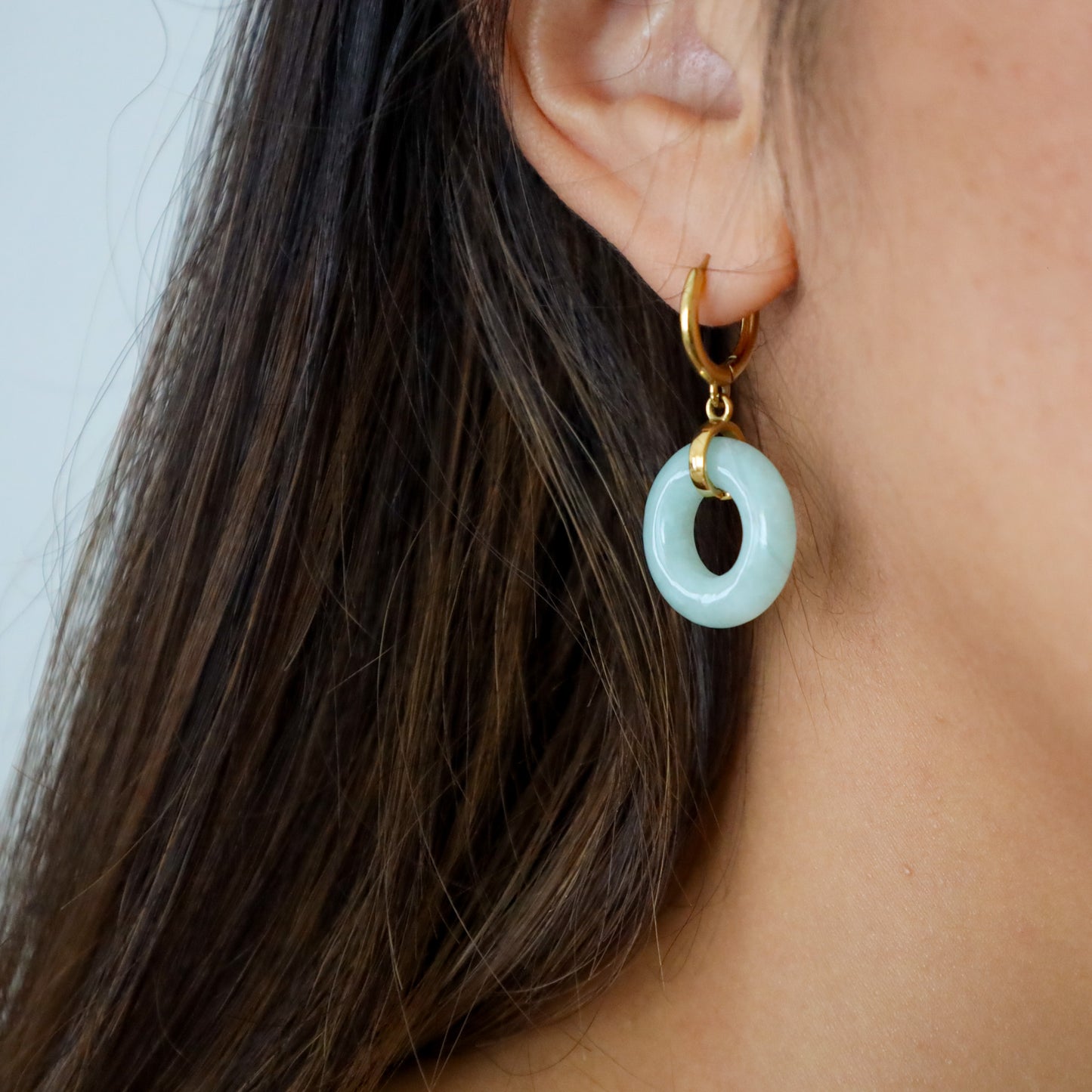 Full Blessing Earrings, gold-plated lucky drop earrings, flat lay - Crowned