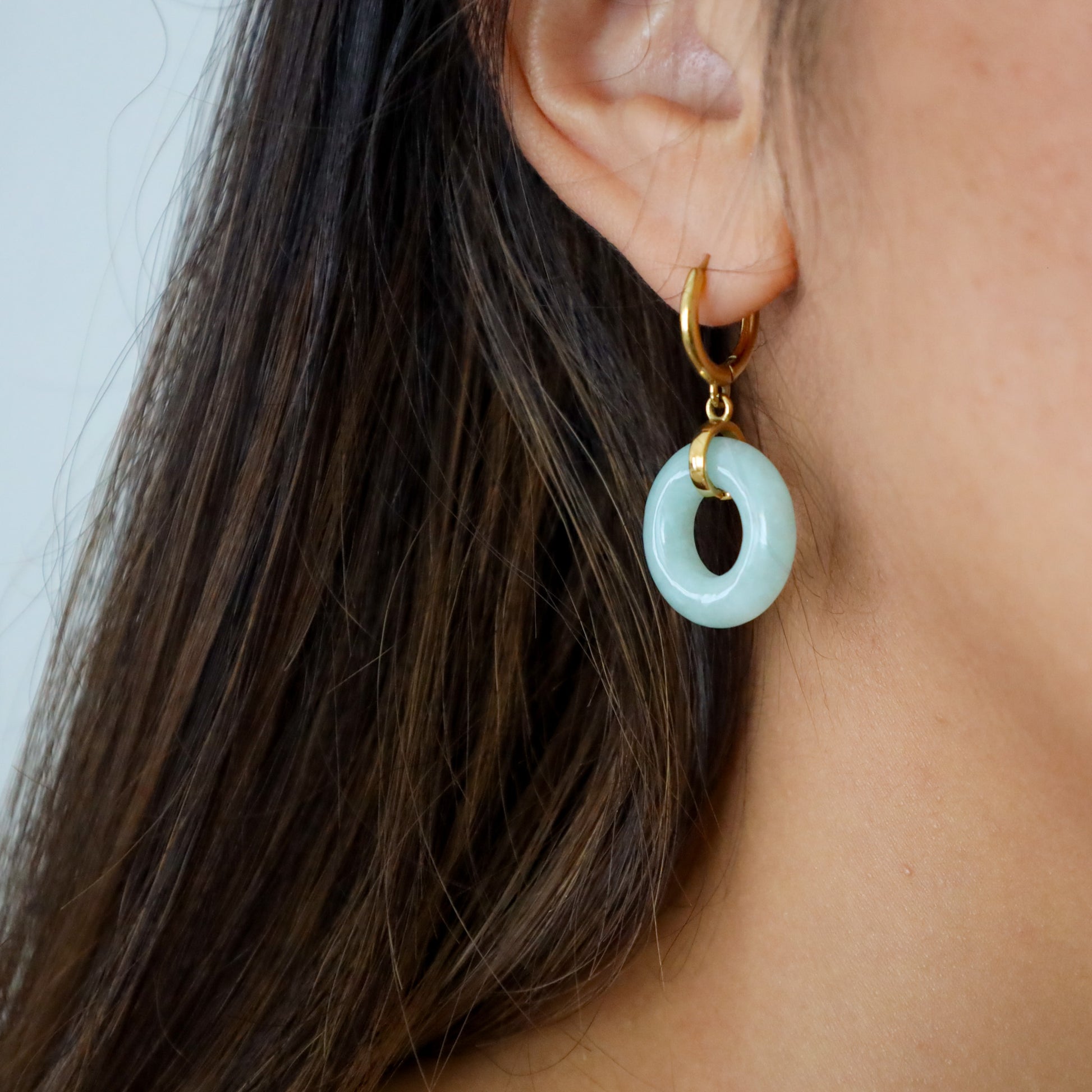 Full Blessing Earrings, gold-plated lucky drop earrings, flat lay - Crowned