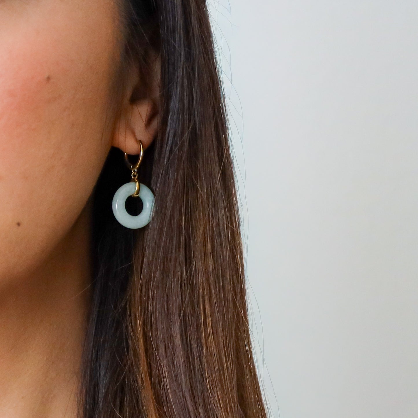 Full Blessing Earrings, gold-plated lucky drop earrings, flat lay - Crowned