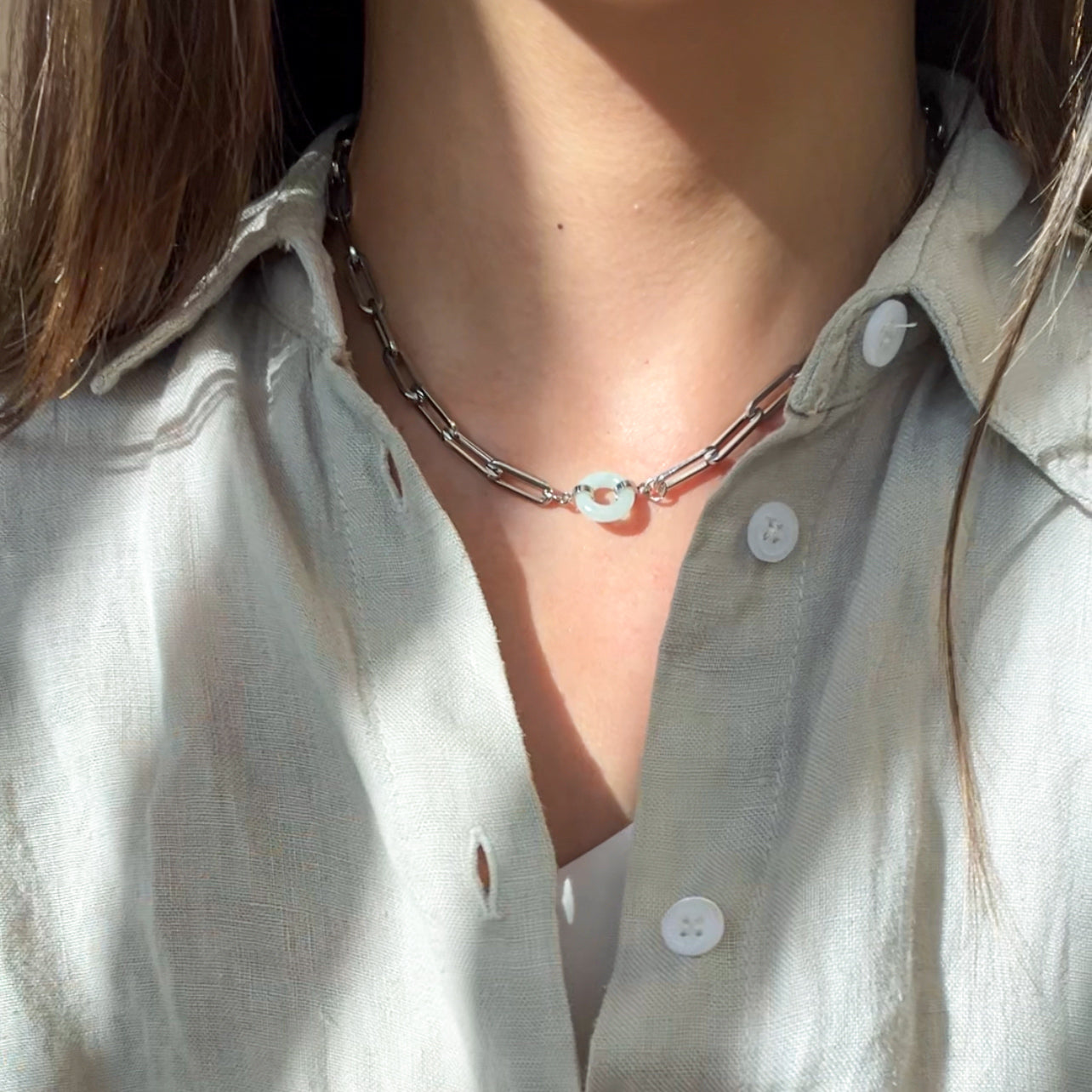 Happiness and Wealth Necklace with jade pendant, silver-plated, wrist view - Crowned