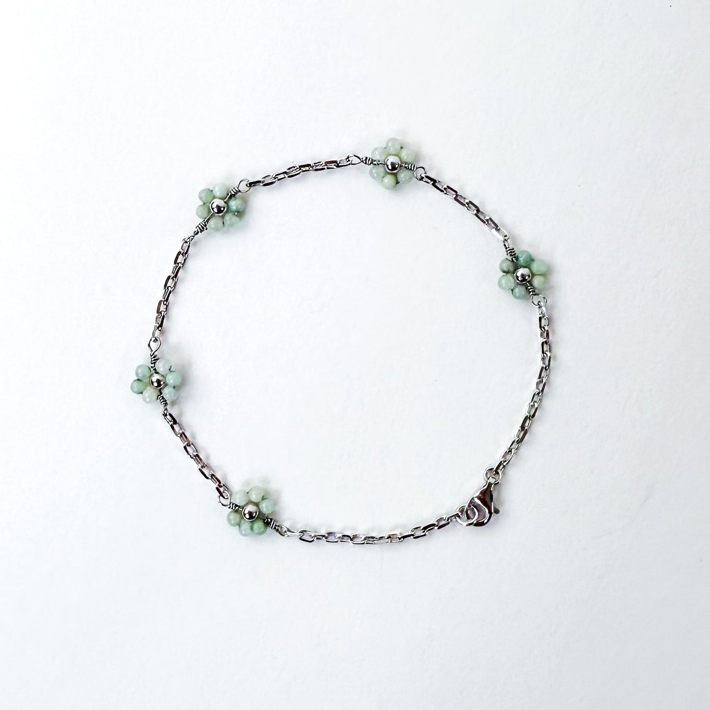 Harmony and Joy Bracelet with Grade A Burmese jade flower, white gold - Crowned
